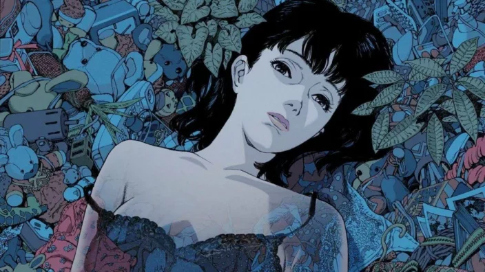 A young dark-haired woman lying in the sea of his childhood's toys and other artifacts of her life