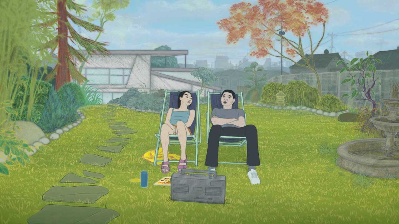 A man and a young woman sitting in sun chairs and talking