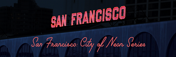 Neon text with pink glowing letters reads San Francisco: City of Neon