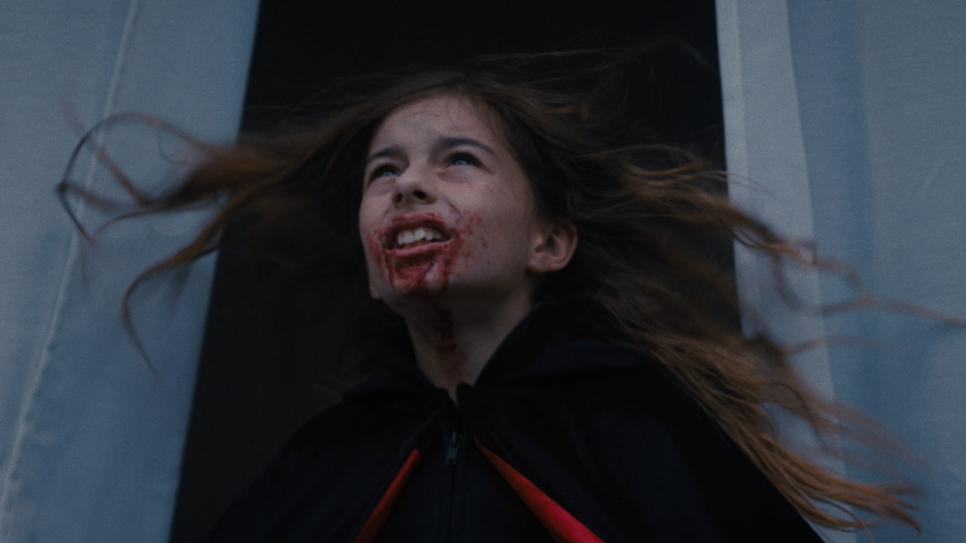 girl with blood running down her mouth