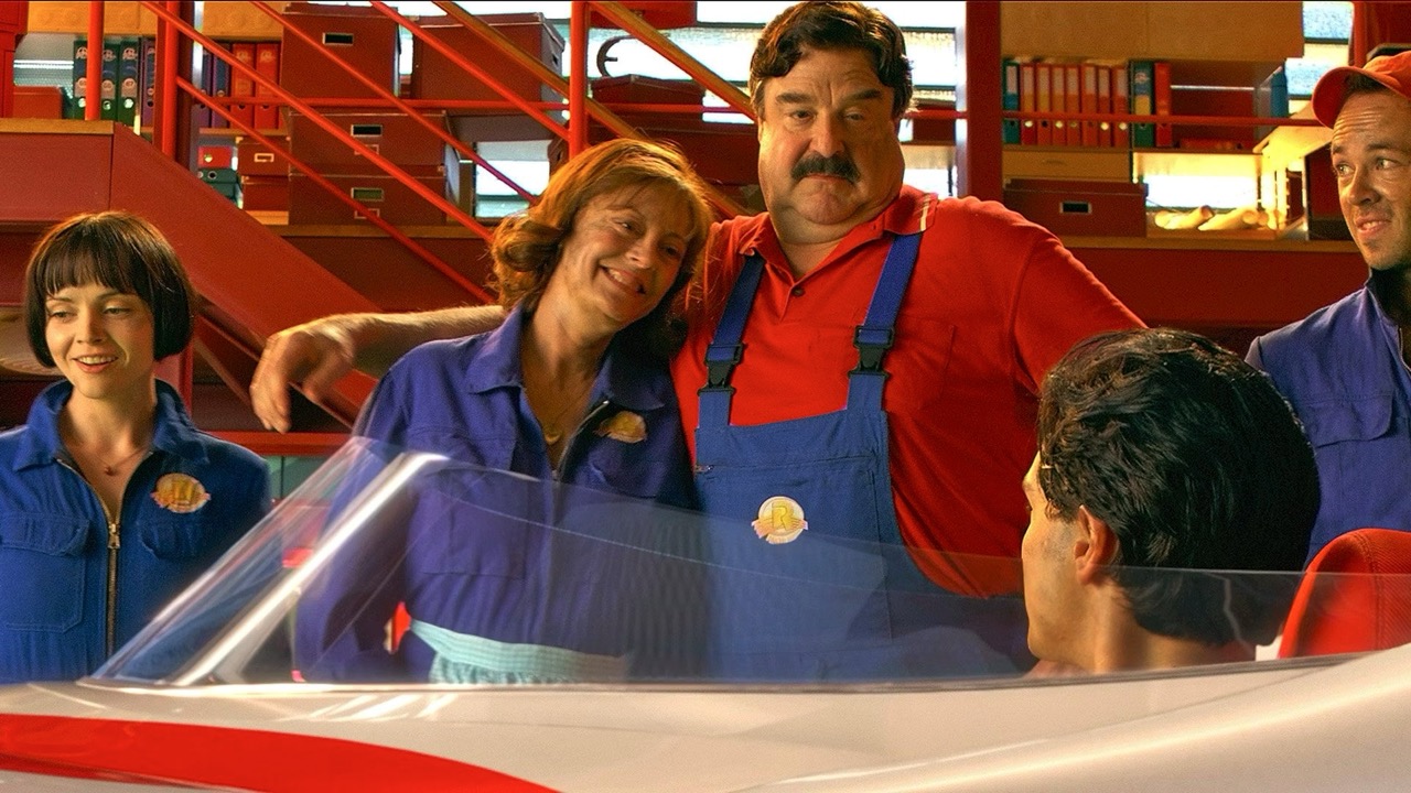 Family looks happy while Speed sits in the car
